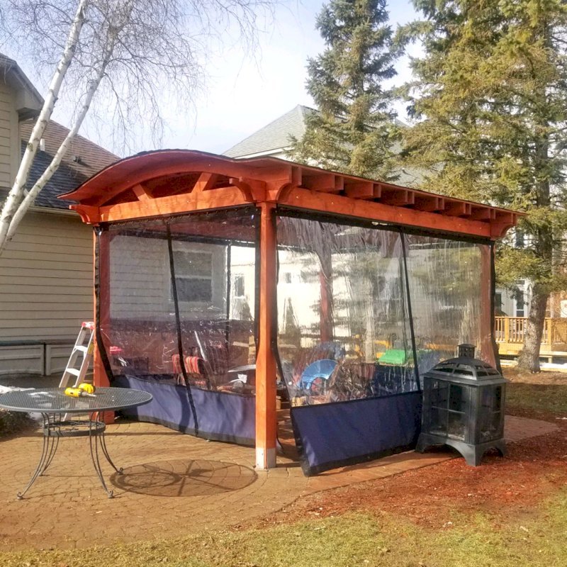Custom Backyard Pavilion Kit with Extra Supports and Braces on Arches Side (Options: 16' L x 12' Arc W, Douglas-fir, 1 Post Electrical Wiring Trim, 4 Post Anchor Kit for HIgh Wind, 1 TV Mount Base by Custom Request, No Privacy Panels, No Curtain Rods, 9 ft Post Height, Cherry-Stain Premium Sealant). Photo Courtesy of E. Chen of Ann Arbor, Michigan. Custom Backyard Pavilion Kit with Extra Supports and Braces on Arches Side (Options: 16' L x 12' Arc W, Douglas-fir, 1 Post Electrical Wiring Trim, 4 Post Anchor Kit for HIgh Wind, 1 TV Mount Base by Custom Request, No Privacy Panels, No Curtain Rods, 9 ft Post Height, Cherry-Stain Premium Sealant). Photo Courtesy of E. Chen of Ann Arbor, Michigan.