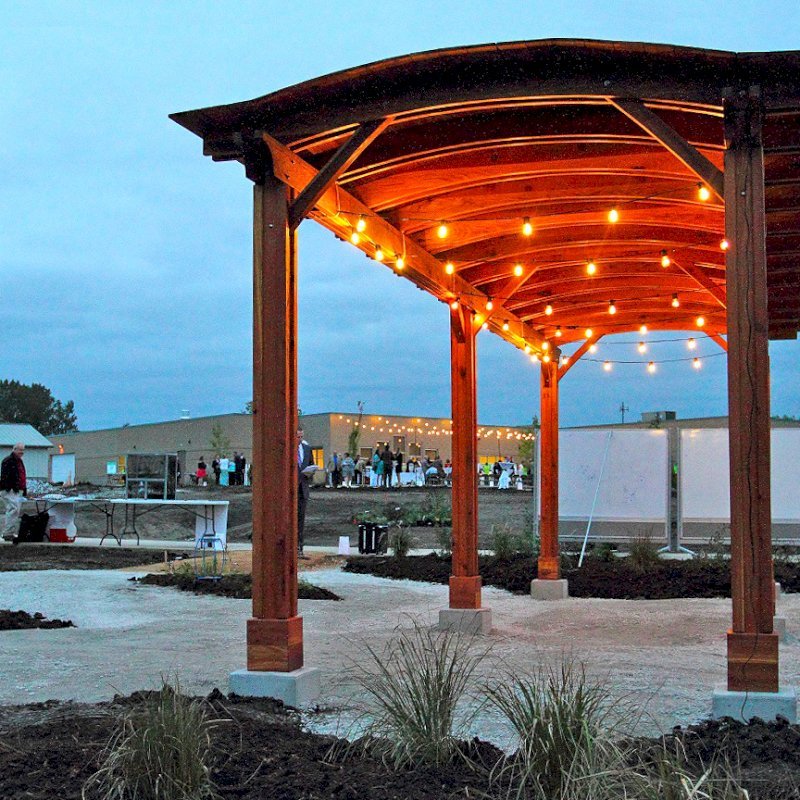 Backyard Pavilion Kits (Options: 30' L x 10' Arc W, California Redwood, No Electrical Wiring Trim, 4 Post Anchor Kit for Gale-Wind, No Ceiling Fan Base, No Privacy Panels, No Curtain Rods, 9 ft Post Height, Transparent Premium Sealant). Photo Courtesy of Sara Wilson of Ankeny, Iowa. Backyard Pavilion Kits (Options: 30' L x 10' Arc W, California Redwood, No Electrical Wiring Trim, 4 Post Anchor Kit for Gale-Wind, No Ceiling Fan Base, No Privacy Panels, No Curtain Rods, 9 ft Post Height, Transparent Premium Sealant). Photo Courtesy of Sara Wilson of Ankeny, Iowa.