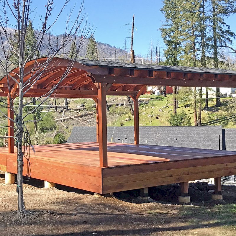 Backyard Pavilion Kits (Options: 20' L x 20' Arc W, California Redwood, 6 Post Anchor Kit for Concrete, No Ceiling Fan Base, No Privacy Panels, No Curtain Rods, 9 ft Post Height, Transparent Premium Sealant) with 10' x 20' Garden Pergola Attached and Custom Deck. Photo Courtesy J. Yurkevich of Middletown, CA. Backyard Pavilion Kits (Options: 20' L x 20' Arc W, California Redwood, 6 Post Anchor Kit for Concrete, No Ceiling Fan Base, No Privacy Panels, No Curtain Rods, 9 ft Post Height, Transparent Premium Sealant) with 10' x 20' Garden Pergola Attached and Custom Deck. Photo Courtesy J. Yurkevich of Middletown, CA.