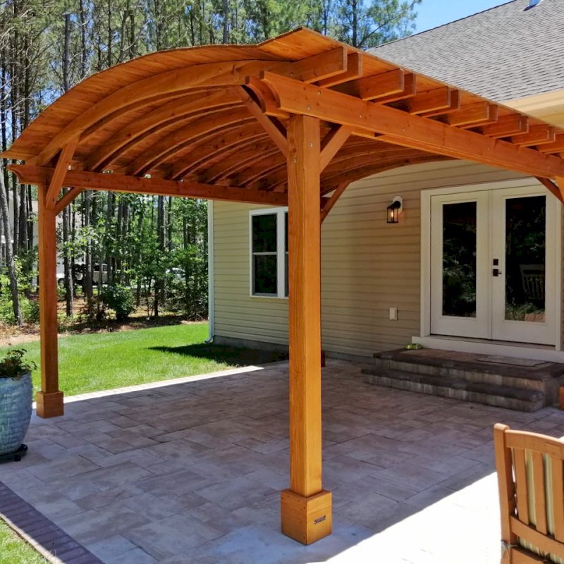 Backyard Pavilion Kits (Options: 16' L x 15' Arc W, Douglas-fir, No Post Electrical Wiring Trim, 4 Post Anchor Kit for Concrete, No Ceiling Fan Base, No Privacy Panels, No Curtain Rods, 9 ft Post Height, Transparent Premium Sealant). Photo Courtesy of S. Fly of Millsboro, Delaware. Backyard Pavilion Kits (Options: 16' L x 15' Arc W, Douglas-fir, No Post Electrical Wiring Trim, 4 Post Anchor Kit for Concrete, No Ceiling Fan Base, No Privacy Panels, No Curtain Rods, 9 ft Post Height, Transparent Premium Sealant). Photo Courtesy of S. Fly of Millsboro, Delaware.