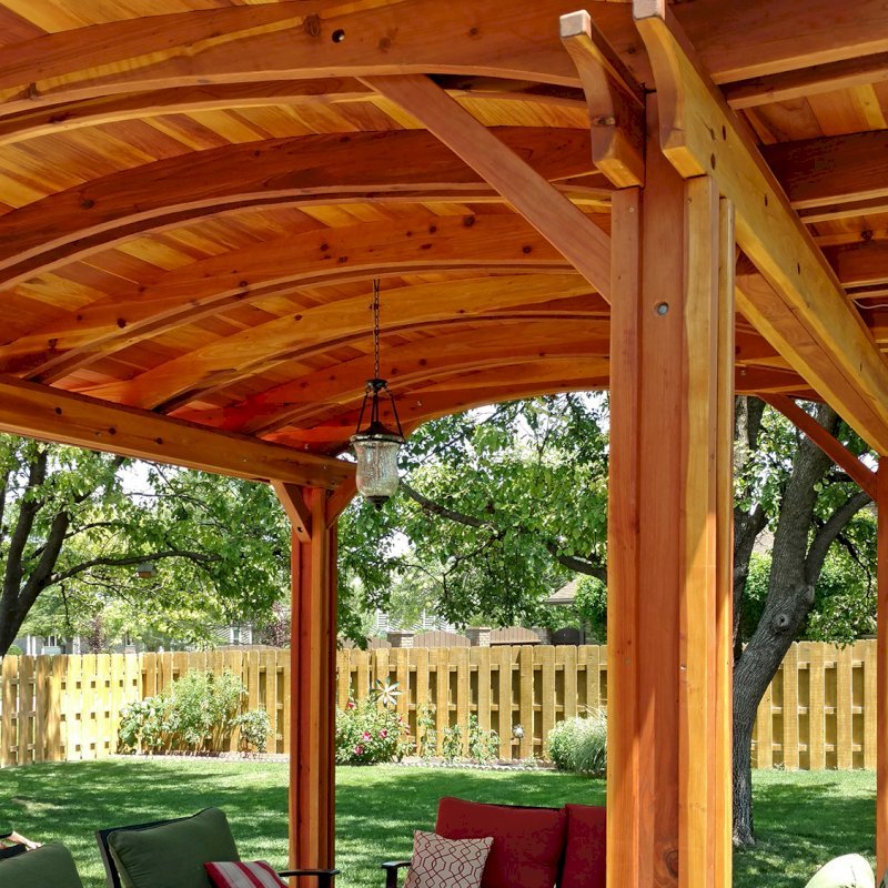 Backyard Pavilion Kits (Options: 14' L x 12' Arc W, California Redwood, No Electrical Wiring Trim, 4 Post Anchor Kit for Concrete, No Ceiling Fan Base, No Privacy Panels, No Curtain Rods, 9 ft Post Height, Transparent Premium Sealant). Photo Courtesy of B. Hardesty of Great Bend, KS. Backyard Pavilion Kits (Options: 14' L x 12' Arc W, California Redwood, No Electrical Wiring Trim, 4 Post Anchor Kit for Concrete, No Ceiling Fan Base, No Privacy Panels, No Curtain Rods, 9 ft Post Height, Transparent Premium Sealant). Photo Courtesy of B. Hardesty of Great Bend, KS.