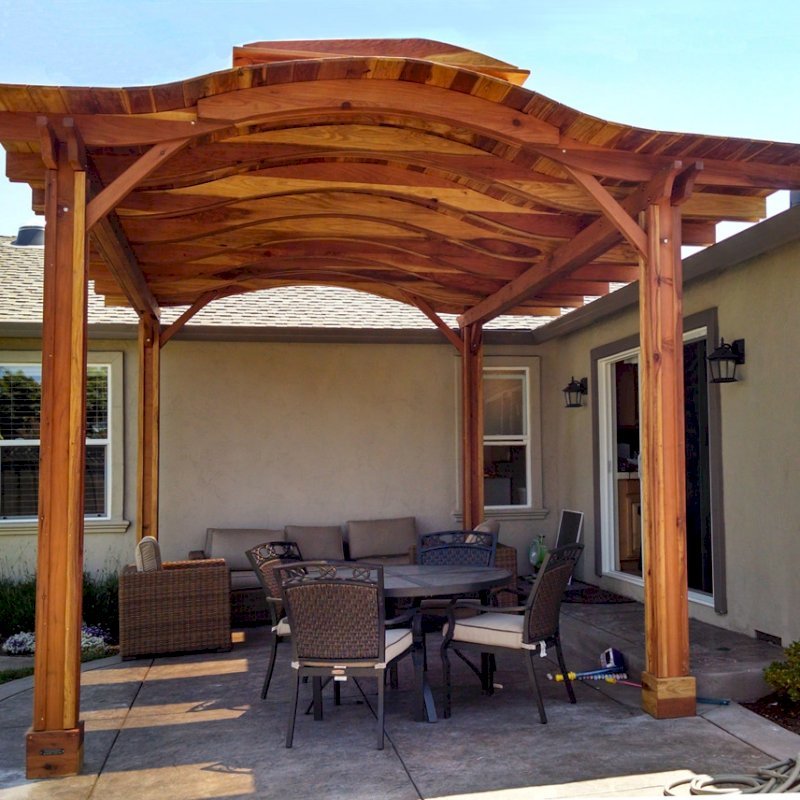 Backyard Pavilion Kits (Options: 18' x 15', California Redwood, No Electrical Wiring Trim, 4 Post Anchor Kit for Stone, No Ceiling Fan Base, No Privacy Panels, No Curtain Rods, 9.5 ft Post Height, Transparent Premium Sealant). Note: Skylights are custom add-on we can do for any size Pavilion roof. Overhang is longer on one side than other by custom request (standard overhang is 12 Backyard Pavilion Kits (Options: 18' x 15', California Redwood, No Electrical Wiring Trim, 4 Post Anchor Kit for Stone, No Ceiling Fan Base, No Privacy Panels, No Curtain Rods, 9.5 ft Post Height, Transparent Premium Sealant). Note: Skylights are custom add-on we can do for any size Pavilion roof. Overhang is longer on one side than other by custom request (standard overhang is 12