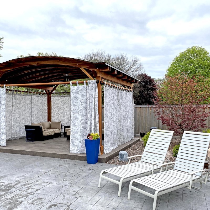 Backyard Pavilion Kits (Options: 15' L x 18' Arc W, California Redwood, 2 Post Electrical Wiring Trims, 4 Post Anchor Kit for Concrete, 1 Ceiling Fan Base, No Privacy Panels, 4 Curtain Rods, 9 ft Post Height, Transparent Premium Sealant). Photo Courtesy of S. McDonald of Lake Barrington, Illinois. Backyard Pavilion Kits (Options: 15' L x 18' Arc W, California Redwood, 2 Post Electrical Wiring Trims, 4 Post Anchor Kit for Concrete, 1 Ceiling Fan Base, No Privacy Panels, 4 Curtain Rods, 9 ft Post Height, Transparent Premium Sealant). Photo Courtesy of S. McDonald of Lake Barrington, Illinois.