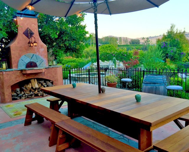 Baja Outdoor Redwood Dining Table (Options: 10 ft L, 48 inches W, Side & End Benches, 2 Half Benches Per Side, California Redwood, Standard Tabletop, Squared Corners, 2" Umbrella Hole, Transparent Premium Sealant). Photo Courtesy of Arjun Reyes of Santa Rosa Valley, CA. Baja Outdoor Redwood Dining Table (Options: 10 ft L, 48 inches W, Side & End Benches, 2 Half Benches Per Side, California Redwood, Standard Tabletop, Squared Corners, 2" Umbrella Hole, Transparent Premium Sealant). Photo Courtesy of Arjun Reyes of Santa Rosa Valley, CA.