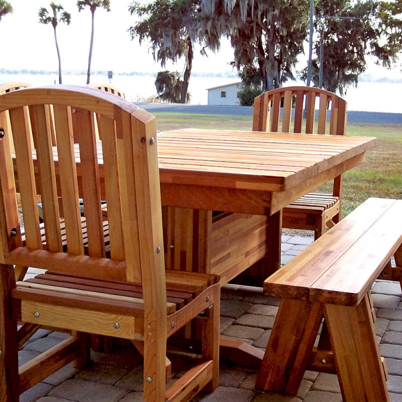 Baja Outdoor Redwood Dining Table (Options: 6 ft L, 42 inches W, Chairs and a Picnic Bench on One Side, Mosaic Eco-Wood, Standard Tabletop, Slightly Rounded Corners, No Umbrella Hole, Transparent Premium Sealant). Customer ordered bench on one side with chairs for other sides. If you would like a custom seating arrangement you don't see on our site, just let us know. Photo Courtesy of B. Woods of Mount Dora, FL. Baja Outdoor Redwood Dining Table (Options: 6 ft L, 42 inches W, Chairs and a Picnic Bench on One Side, Mosaic Eco-Wood, Standard Tabletop, Slightly Rounded Corners, No Umbrella Hole, Transparent Premium Sealant). Customer ordered bench on one side with chairs for other sides. If you would like a custom seating arrangement you don't see on our site, just let us know. Photo Courtesy of B. Woods of Mount Dora, FL.