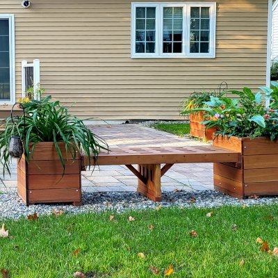 Bench and Planters Combo (Options: 5 ft Bench Length, 20" L x 20" D x 24" H Planter Size, Douglas-fir, Lighthouse Bench Style, 18 1/2 inches Bench Height, 19 1/2 inches Bench Width, Custom Engraving, Mendocino Planter Style, With Feet, No Growing Vegetables, Transparent Premium Sealant). Photo Courtesy of S. Korapati of East Brunswick, NJ.