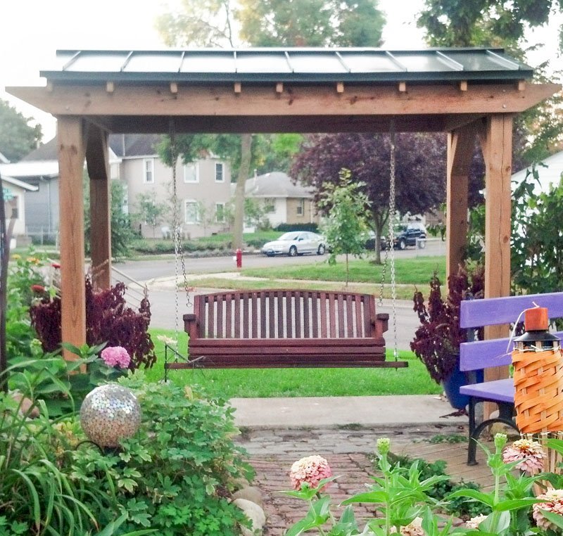 Bench Swings (Seats Only) (Options: Large Garden Bench, Old-Growth Redwood, Luna Backrest Seat, No Engraving, All Beam Hanging Hardware, Cherry Stain Premium Sealant). Photo Courtesy of Robert MacDonald of Minneapolis, Minnesota. Pergola is a custom job made in Douglas-fir. Bench Swings (Seats Only) (Options: Large Garden Bench, Old-Growth Redwood, Luna Backrest Seat, No Engraving, All Beam Hanging Hardware, Cherry Stain Premium Sealant). Photo Courtesy of Robert MacDonald of Minneapolis, Minnesota. Pergola is a custom job made in Douglas-fir.