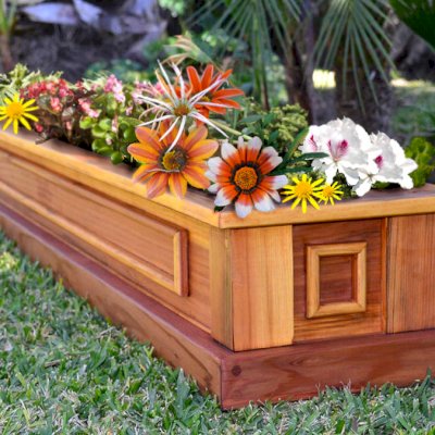 Carmel Box Planters (Options: 60" L, 10.5" W, 7.5" H, California Redwood, Standard Base, No Steel Hangers, No fit over railings, Interior and Exterior of Box with Sealant (No Growing Vegetables), Transparent Premium Sealant). Yes, the flowers are made of silk, but they looked so pretty we had to include them!