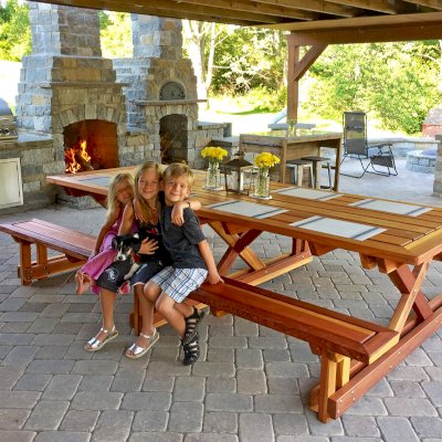 Chris's Picnic Table (Attached Benches) (Options: 10' L x 46" W, California Redwood, Standard Tabletop, Slightly Rounded Corners, No Umbrella Hole, Transparent Premium Sealant). Photo Courtesy of Marie P. of Cincinnati, OH.