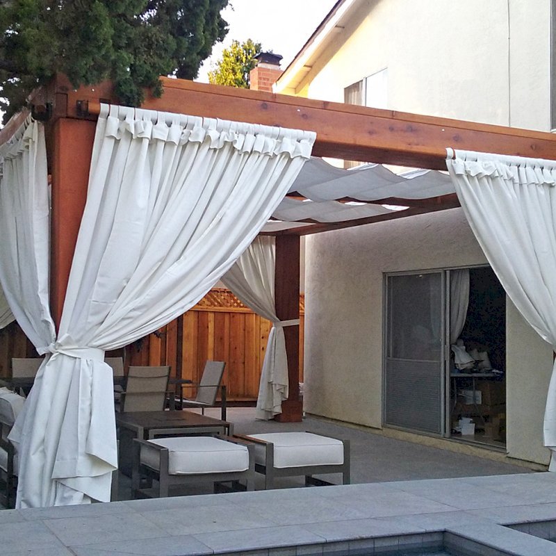 Custom Wooden Fat Timber Pergola (Options: 20' L, 16' W, Old-Growth Redwood, 4 Electrical Wiring Trims, with 2 3/4" x 11 1/4" Roof Timbers and 11 1/4" x 11 1/4" Posts, 4 Post Anchor Kit for Hurricane, No Privacy Panels, Curtain Rods on 4 sides, 10' Post Height, Transparent Premium Sealant). Retractable Canopy designed in cooperation with Infinity Canopy of Los Angeles, CA (www.infinitycanopy.com). Once you have your design finalized, you can forward your drawings to Infinity to add the perfect retractable canopy solution for maximum shade versatility! Photo Courtesy of Darren & Elva Linscott of San Jose, CA. Custom Wooden Fat Timber Pergola (Options: 20' L, 16' W, Old-Growth Redwood, 4 Electrical Wiring Trims, with 2 3/4" x 11 1/4" Roof Timbers and 11 1/4" x 11 1/4" Posts, 4 Post Anchor Kit for Hurricane, No Privacy Panels, Curtain Rods on 4 sides, 10' Post Height, Transparent Premium Sealant). Retractable Canopy designed in cooperation with Infinity Canopy of Los Angeles, CA (www.infinitycanopy.com). Once you have your design finalized, you can forward your drawings to Infinity to add the perfect retractable canopy solution for maximum shade versatility! Photo Courtesy of Darren & Elva Linscott of San Jose, CA.