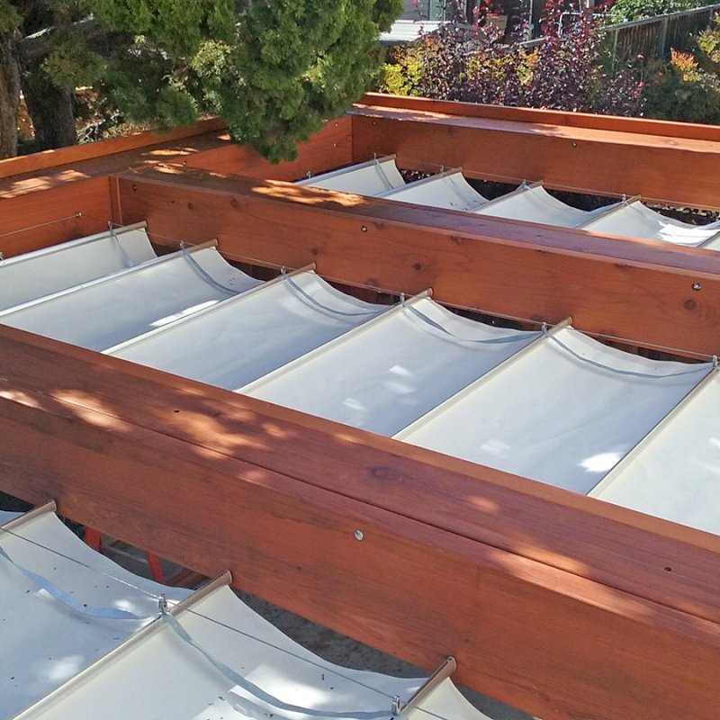Custom Wooden Fat Timber Pergola (Options: 20' L, 16' W, Old-Growth Redwood, 4 Electrical Wiring Trims, with 2 3/4" x 11 1/4" Roof Timbers and 11 1/4" x 11 1/4" Posts, 4 Post Anchor Kit for Hurricane, No Privacy Panels, Curtain Rods on 4 sides, 10' Post Height, Transparent Premium Sealant). Retractable Canopy designed in cooperation with Infinity Canopy of Los Angeles, CA (www.infinitycanopy.com). Once you have your design finalized, you can forward your drawings to Infinity to add the perfect retractable canopy solution for maximum shade versatility! Photo Courtesy of Darren & Elva Linscott of San Jose, CA. Custom Wooden Fat Timber Pergola (Options: 20' L, 16' W, Old-Growth Redwood, 4 Electrical Wiring Trims, with 2 3/4" x 11 1/4" Roof Timbers and 11 1/4" x 11 1/4" Posts, 4 Post Anchor Kit for Hurricane, No Privacy Panels, Curtain Rods on 4 sides, 10' Post Height, Transparent Premium Sealant). Retractable Canopy designed in cooperation with Infinity Canopy of Los Angeles, CA (www.infinitycanopy.com). Once you have your design finalized, you can forward your drawings to Infinity to add the perfect retractable canopy solution for maximum shade versatility! Photo Courtesy of Darren & Elva Linscott of San Jose, CA.