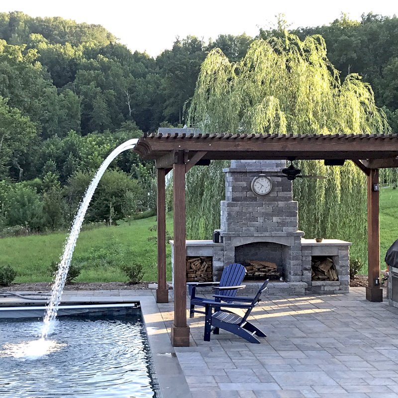 Custom Garden Pergola (Options: 16' L x 16' W, California Redwood, 4-Post Anchor Kit for Concrete, Cherry Stain Premium Sealant). Plumbing was built into the timbers to create a waterfall. Photo Courtesy of D. Hogan of Charlottesville, Virginia. Custom Garden Pergola (Options: 16' L x 16' W, California Redwood, 4-Post Anchor Kit for Concrete, Cherry Stain Premium Sealant). Plumbing was built into the timbers to create a waterfall. Photo Courtesy of D. Hogan of Charlottesville, Virginia.