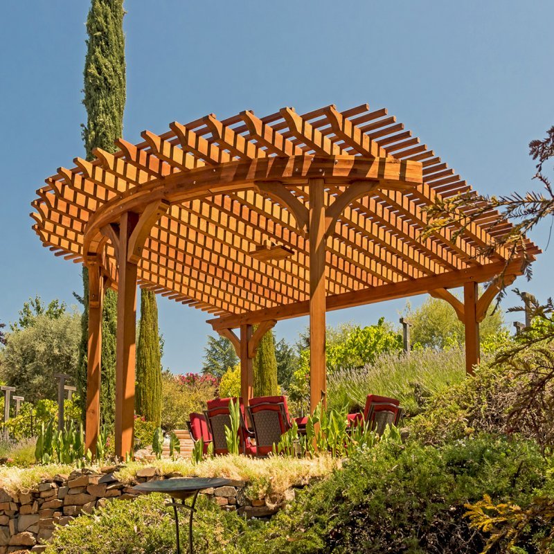 Custom Wooden Pergola (Options: 17' L x 17' W, California Redwood, Electrical Wiring Trim for 1 Post, 5-Post Anchor Kit for Concrete, No Ceiling Fan Base, No Privacy Panels, No Curtain Rods, Transparent Premium Sealant). Photo Courtesy of K. Drahmann of El Dorado Hills, CA. Custom Wooden Pergola (Options: 17' L x 17' W, California Redwood, Electrical Wiring Trim for 1 Post, 5-Post Anchor Kit for Concrete, No Ceiling Fan Base, No Privacy Panels, No Curtain Rods, Transparent Premium Sealant). Photo Courtesy of K. Drahmann of El Dorado Hills, CA.