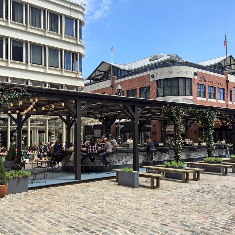 Custom Wooden Pergola (Options: 82' L x 16' W, Douglas-fir, Open Roof with Rafters at 18", with Transparent Rain Guard, 12-Post Anchor Kit, No Ceiling Fan Base, 12' Post Height, Custom Black Paint). This pergola is part of the giant popup beer hall at the Southside Seaport in downtown Manhattan from May to Oct 2017: https://www.timeout.com/newyork/blog/a-giant-pop-up-beer-hall-is-opening-at-south-street-seaport-this-summer-032417 Custom Wooden Pergola (Options: 82' L x 16' W, Douglas-fir, Open Roof with Rafters at 18", with Transparent Rain Guard, 12-Post Anchor Kit, No Ceiling Fan Base, 12' Post Height, Custom Black Paint). This pergola is part of the giant popup beer hall at the Southside Seaport in downtown Manhattan from May to Oct 2017: https://www.timeout.com/newyork/blog/a-giant-pop-up-beer-hall-is-opening-at-south-street-seaport-this-summer-032417
