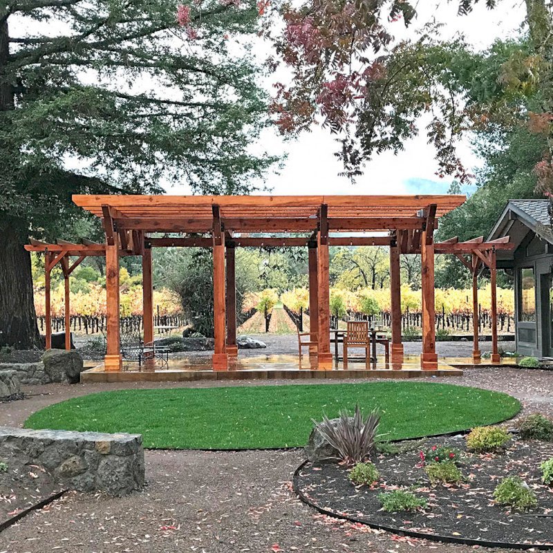 Custom Wooden Pergola (Options: 28' x 20', California Redwood, Posts Anchor Kit for Concrete, Transparent Premium Sealant). Photo Courtesy of S. Taplin of St. Helena, CA. Custom Wooden Pergola (Options: 28' x 20', California Redwood, Posts Anchor Kit for Concrete, Transparent Premium Sealant). Photo Courtesy of S. Taplin of St. Helena, CA.
