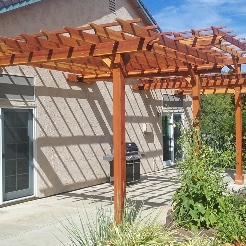 Custom Wooden Pergola (Options: 35' L, 13' W, California Redwood, No Electrical Wiring Trim, 4-Post Anchor Kit for Concrete, No Privacy Panels, No Curtain Rods, 10' & 11' Post Height, Transparent Premium Sealant). Photo Courtesy of D. Drake of Auburn, CA. Custom Wooden Pergola (Options: 35' L, 13' W, California Redwood, No Electrical Wiring Trim, 4-Post Anchor Kit for Concrete, No Privacy Panels, No Curtain Rods, 10' & 11' Post Height, Transparent Premium Sealant). Photo Courtesy of D. Drake of Auburn, CA.