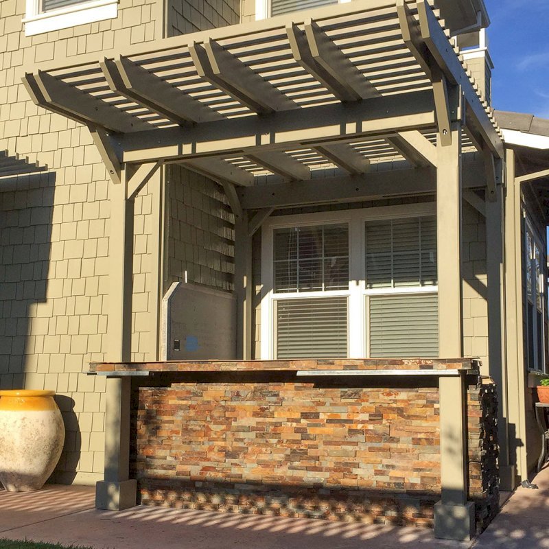 Custom Wooden Pergola (Options:12' x 9', California Redwood, Gray Oil-Based Primer and Custom Paint). Photo Courtesy of Unlimited Outdoor Kitchens of San Jose, CA. Custom Wooden Pergola (Options:12' x 9', California Redwood, Gray Oil-Based Primer and Custom Paint). Photo Courtesy of Unlimited Outdoor Kitchens of San Jose, CA.