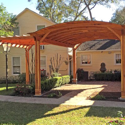 Custom Garden Pergola Attached to a Backyard Pavilion (Options:10' L x 15' W [Pavilion Size is 24' L x 16' Arc W], California Redwood, Unattached, 2 Post Electrical Wiring Trim, 6-Post Anchor Kit for High-Wind, With 2 Ceiling Fan Bases on Pavilion, No Privacy Panels, No Curtain Rods, 10 ft Post Height, Transparent Premium Sealant). Photo Courtesy of Jeff A. of San Ramon, CA.