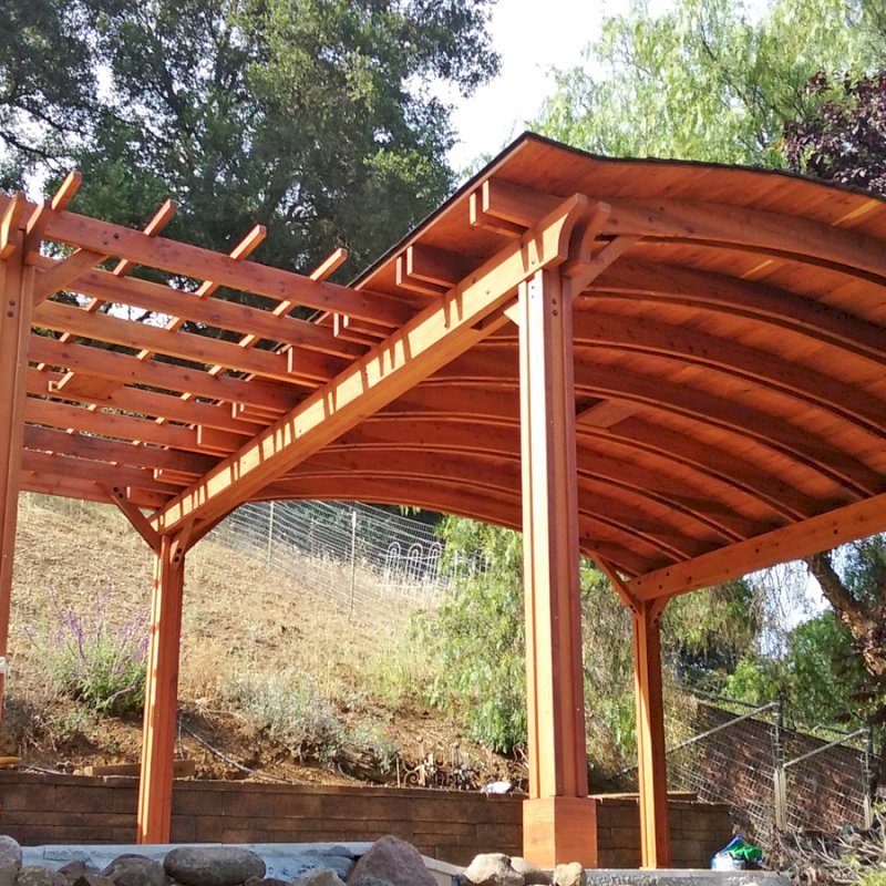 Custom Wooden Pergola with Pavilion (Options: Mature Redwood with Pavilion Ceiling in Old-Growth Redwood, with 2 Fan Bases, Electrical Wiring Trim Kit for 1 Post, 6-Post Anchor Kit for High-Wind, Transparent Premium Sealant). Backyard Pavilion is sized 18 x 18 ft and Garden Pergola is 9 x 14 ft. Yes, you can mix and match different pergola and pavilions in almost any size and configuration to make the perfect shade structure for your yard. Photo Courtesy of Joan Angwin of Morgan Hill, CA. Custom Wooden Pergola with Pavilion (Options: Mature Redwood with Pavilion Ceiling in Old-Growth Redwood, with 2 Fan Bases, Electrical Wiring Trim Kit for 1 Post, 6-Post Anchor Kit for High-Wind, Transparent Premium Sealant). Backyard Pavilion is sized 18 x 18 ft and Garden Pergola is 9 x 14 ft. Yes, you can mix and match different pergola and pavilions in almost any size and configuration to make the perfect shade structure for your yard. Photo Courtesy of Joan Angwin of Morgan Hill, CA.