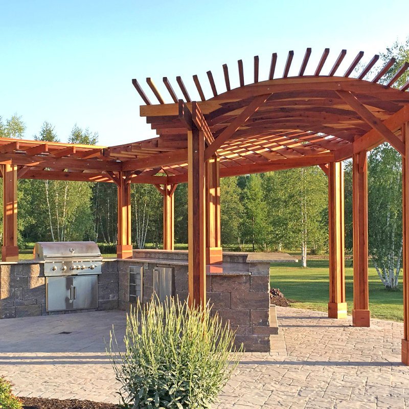 Custom Wooden Pergola (Options: 33' L, 11'-6" W, California Redwood, 1 Electrical Wiring Trim, 10-Post Anchor Kit for Concrete, No Privacy Panels, No Curtain Rods, 9' Post Height, Transparent Premium Sealant). Photo Courtesy of D. Pollock of Baldwinsville, NY. Custom Wooden Pergola (Options: 33' L, 11'-6" W, California Redwood, 1 Electrical Wiring Trim, 10-Post Anchor Kit for Concrete, No Privacy Panels, No Curtain Rods, 9' Post Height, Transparent Premium Sealant). Photo Courtesy of D. Pollock of Baldwinsville, NY.