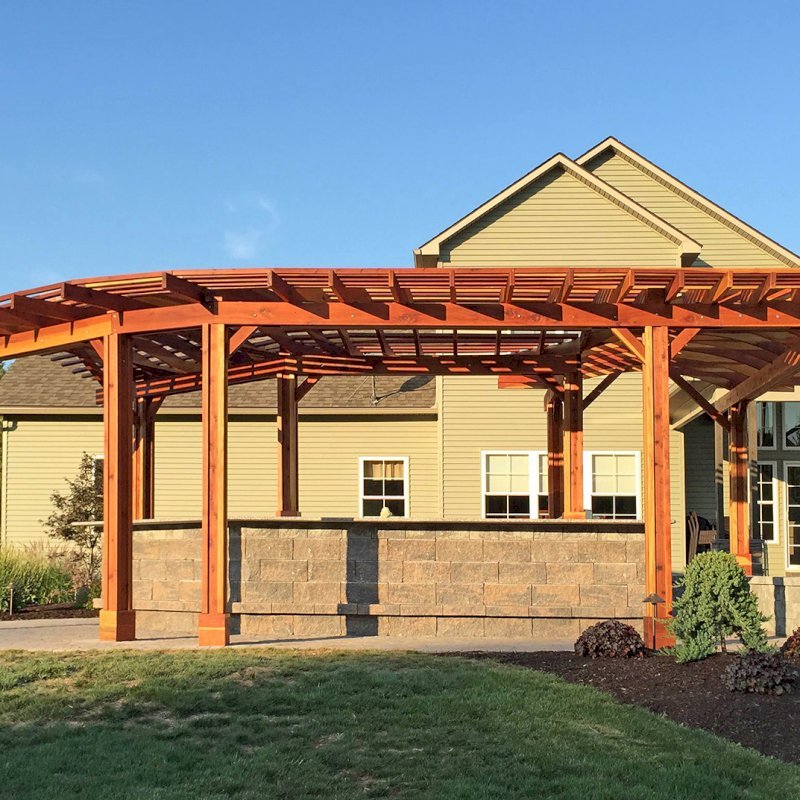 Custom Wooden Pergola (Options: 33' L, 11'-6" W, California Redwood, 1 Electrical Wiring Trim, 10-Post Anchor Kit for Concrete, No Privacy Panels, No Curtain Rods, 9' Post Height, Transparent Premium Sealant). Photo Courtesy of D. Pollock of Baldwinsville, NY. Custom Wooden Pergola (Options: 33' L, 11'-6" W, California Redwood, 1 Electrical Wiring Trim, 10-Post Anchor Kit for Concrete, No Privacy Panels, No Curtain Rods, 9' Post Height, Transparent Premium Sealant). Photo Courtesy of D. Pollock of Baldwinsville, NY.