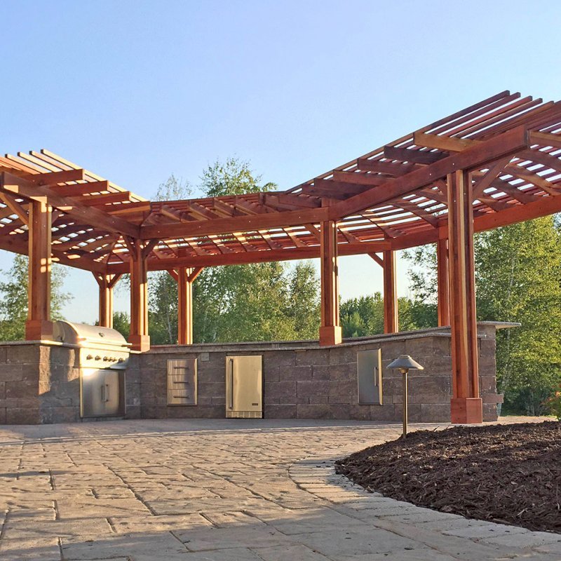 Custom Wooden Pergola (Options: 33' L, 11'-6" W, California Redwood, 1 Electrical Wiring Trim, 10-Post Anchor Kit for Concrete, No Privacy Panels, No Curtain Rods, 9' Post Height, Transparent Premium Sealant). Photo Courtesy of D. Pollock of Baldwinsville, NY. Custom Wooden Pergola (Options: 33' L, 11'-6" W, California Redwood, 1 Electrical Wiring Trim, 10-Post Anchor Kit for Concrete, No Privacy Panels, No Curtain Rods, 9' Post Height, Transparent Premium Sealant). Photo Courtesy of D. Pollock of Baldwinsville, NY.