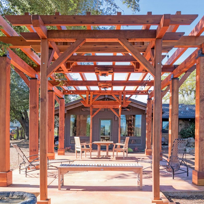 Custom Wooden Pergola (Options: 28' x 20', California Redwood, Posts Anchor Kit for Concrete, Transparent Premium Sealant). Photo Courtesy of S. Taplin of St. Helena, CA. Custom Wooden Pergola (Options: 28' x 20', California Redwood, Posts Anchor Kit for Concrete, Transparent Premium Sealant). Photo Courtesy of S. Taplin of St. Helena, CA.
