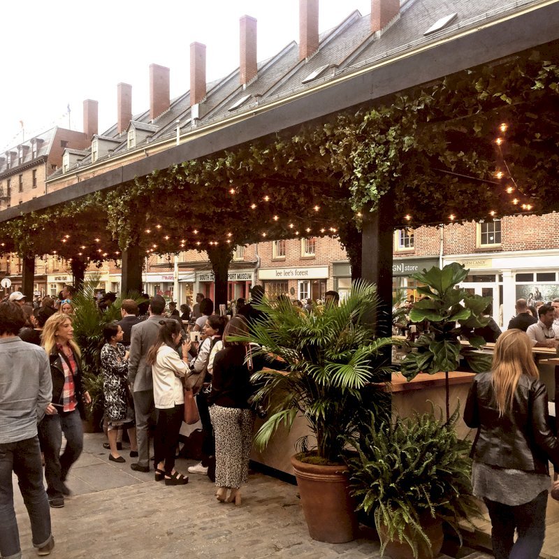 Custom Wooden Pergola (Options: 82' L x 16' W, Douglas-fir, Open Roof with Rafters at 18", with Transparent Rain Guard, 12-Post Anchor Kit, No Ceiling Fan Base, 12' Post Height, Custom Black Paint). This pergola is part of the giant popup beer hall at the Southside Seaport in downtown Manhattan from May to Oct 2017: https://www.timeout.com/newyork/blog/a-giant-pop-up-beer-hall-is-opening-at-south-street-seaport-this-summer-032417 Custom Wooden Pergola (Options: 82' L x 16' W, Douglas-fir, Open Roof with Rafters at 18", with Transparent Rain Guard, 12-Post Anchor Kit, No Ceiling Fan Base, 12' Post Height, Custom Black Paint). This pergola is part of the giant popup beer hall at the Southside Seaport in downtown Manhattan from May to Oct 2017: https://www.timeout.com/newyork/blog/a-giant-pop-up-beer-hall-is-opening-at-south-street-seaport-this-summer-032417