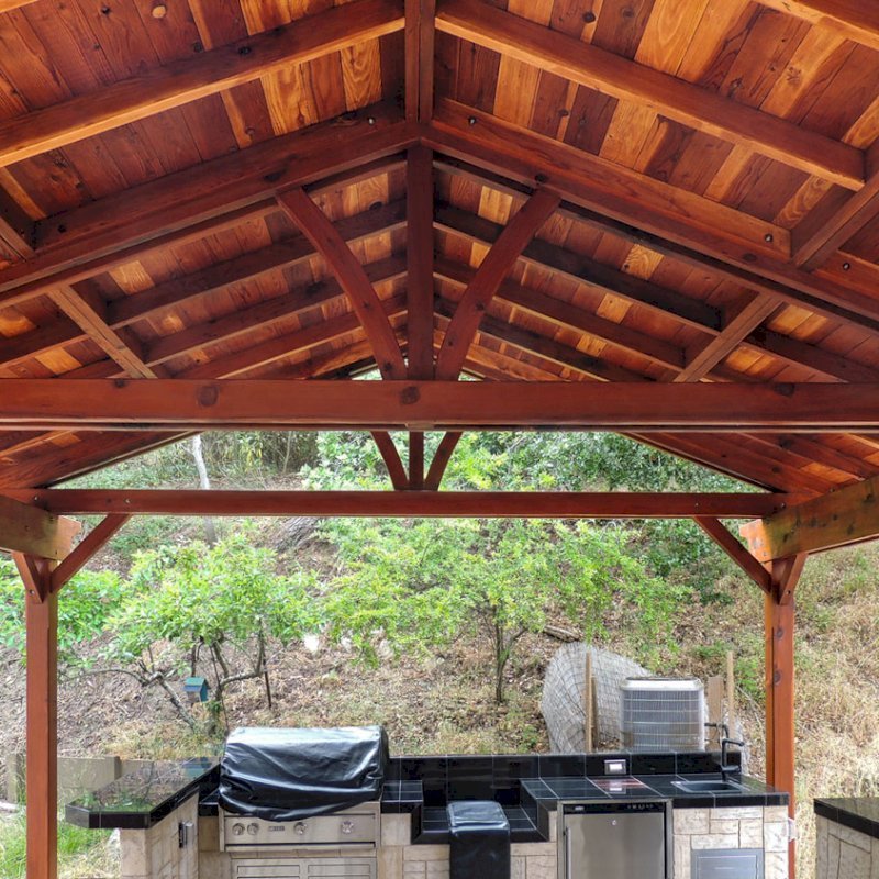 Del Norte Outdoor Kitchen Pavilion (Options: 22' L x 22' W, California Redwood, Unattached, 6 Post Anchor Kit for Stone, Brick or Concrete, No Electrical Wiring, 9 ft Post Height, No Ceiling Fan Base, No Privacy Panels, No Curtain Rods,Transparent Sealant). Photo Courtesy of El Laurel Resort of Baja, Mexico. Del Norte Outdoor Kitchen Pavilion (Options: 22' L x 22' W, California Redwood, Unattached, 6 Post Anchor Kit for Stone, Brick or Concrete, No Electrical Wiring, 9 ft Post Height, No Ceiling Fan Base, No Privacy Panels, No Curtain Rods,Transparent Sealant). Photo Courtesy of El Laurel Resort of Baja, Mexico.