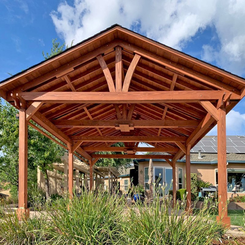 Del Norte Outdoor Kitchen Pavilion (Options: 25' L x 18' W, Douglas-fir, 6-Post Kit for High-Wind, 2 Ceiling Fan Bases, 1 Electrical Wiring Trim Kit, No Post Decorative Trims, Coffee-Stain Premium Sealant). Photo Courtesy of D. Tornincasa of Placerville, California. Del Norte Outdoor Kitchen Pavilion (Options: 25' L x 18' W, Douglas-fir, 6-Post Kit for High-Wind, 2 Ceiling Fan Bases, 1 Electrical Wiring Trim Kit, No Post Decorative Trims, Coffee-Stain Premium Sealant). Photo Courtesy of D. Tornincasa of Placerville, California.