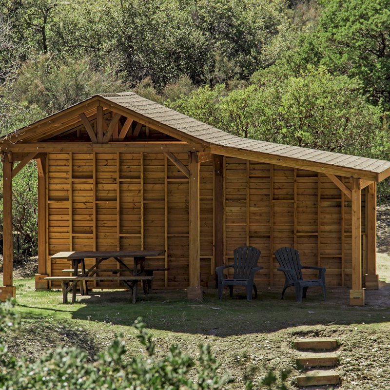 Custom Del Norte Outdoor Kitchen Pavilion (Options: 12' L x 12' W, with 9' x 12' Shed Pavilion Attached, Douglas-fir, 6-Post Kit for High-Wind, No Ceiling Fan Base, No Electrical Wiring Trim Kit, No Post Decorative Trims, with Custom Solid Wall, Transparent Premium Sealant). Photo Courtesy of J. Randall of Warner Springs, CA. Custom Del Norte Outdoor Kitchen Pavilion (Options: 12' L x 12' W, with 9' x 12' Shed Pavilion Attached, Douglas-fir, 6-Post Kit for High-Wind, No Ceiling Fan Base, No Electrical Wiring Trim Kit, No Post Decorative Trims, with Custom Solid Wall, Transparent Premium Sealant). Photo Courtesy of J. Randall of Warner Springs, CA.