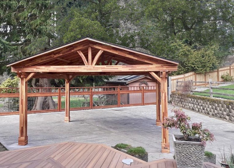 Del Norte Outdoor Kitchen Pavilion (Options: 18' L x 18' W, Mosaic Eco-Wood, 4-Post Kit for Concrete, No Ceiling Fan Base, No Electrical Wiring Trim Kit, Vertical Post Decorative Trim, Transparent Premium Sealant). Photo Courtesy of L. Foulk of Maple Valley, Washington. Del Norte Outdoor Kitchen Pavilion (Options: 18' L x 18' W, Mosaic Eco-Wood, 4-Post Kit for Concrete, No Ceiling Fan Base, No Electrical Wiring Trim Kit, Vertical Post Decorative Trim, Transparent Premium Sealant). Photo Courtesy of L. Foulk of Maple Valley, Washington.