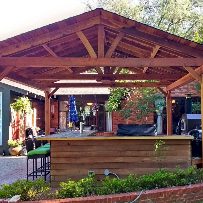 Del Norte Outdoor Kitchen Pavilion (Options: 18' L x 18' W, California Redwood, 4-Post Kit for Concrete, With a Ceiling Fan Base, Electrical Wiring Trim Kit for 2 Posts, Transparent Premium Sealant). Photo Courtesy of D. Blakelock of Dallas, TX. Del Norte Outdoor Kitchen Pavilion (Options: 18' L x 18' W, California Redwood, 4-Post Kit for Concrete, With a Ceiling Fan Base, Electrical Wiring Trim Kit for 2 Posts, Transparent Premium Sealant). Photo Courtesy of D. Blakelock of Dallas, TX.