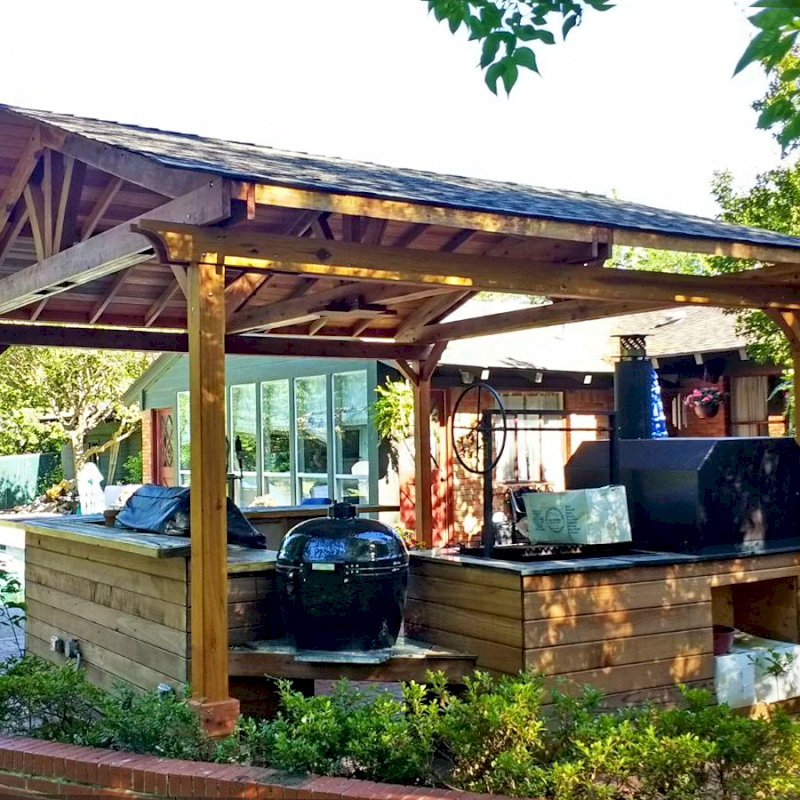 Del Norte Outdoor Kitchen Pavilion (Options: 18' L x 18' W, California Redwood, 4-Post Kit for Concrete, With a Ceiling Fan Base, Electrical Wiring Trim Kit for 2 Posts, Transparent Premium Sealant). Photo Courtesy of D. Blakelock of Dallas, TX. Del Norte Outdoor Kitchen Pavilion (Options: 18' L x 18' W, California Redwood, 4-Post Kit for Concrete, With a Ceiling Fan Base, Electrical Wiring Trim Kit for 2 Posts, Transparent Premium Sealant). Photo Courtesy of D. Blakelock of Dallas, TX.