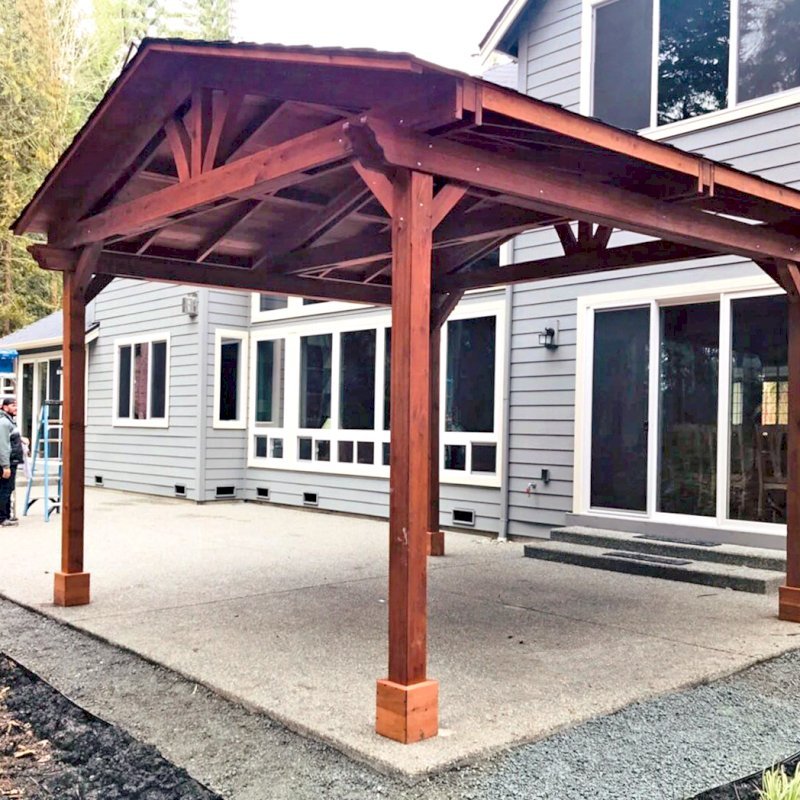 Del Norte Outdoor Kitchen Pavilion (Options: 16' L x 16' W, Mature Redwood, 4-Post Kit for Concrete, No Ceiling Fan Bases, No Electrical Wiring Trim Kit, No Post Decorative Trim, Transparent Premium Sealant). Photo Courtesy of D. Adams of Bellevue, WA. Del Norte Outdoor Kitchen Pavilion (Options: 16' L x 16' W, Mature Redwood, 4-Post Kit for Concrete, No Ceiling Fan Bases, No Electrical Wiring Trim Kit, No Post Decorative Trim, Transparent Premium Sealant). Photo Courtesy of D. Adams of Bellevue, WA.