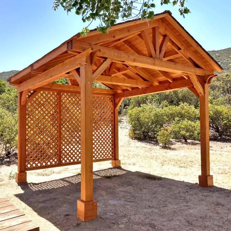 Del Norte Outdoor Kitchen Pavilion (Options: 12' L x 12' W, 1 Full Wall Lattice Privacy Panel, Douglas-fir, 4-Post Kit for Gale-Wind, No Ceiling Fan Base, No Electrical Wiring Trim Kit, No Post Decorative Trims, Transparent Premium Sealant). Photo Courtesy of J. Randall of Warner Springs, CA. Del Norte Outdoor Kitchen Pavilion (Options: 12' L x 12' W, 1 Full Wall Lattice Privacy Panel, Douglas-fir, 4-Post Kit for Gale-Wind, No Ceiling Fan Base, No Electrical Wiring Trim Kit, No Post Decorative Trims, Transparent Premium Sealant). Photo Courtesy of J. Randall of Warner Springs, CA.
