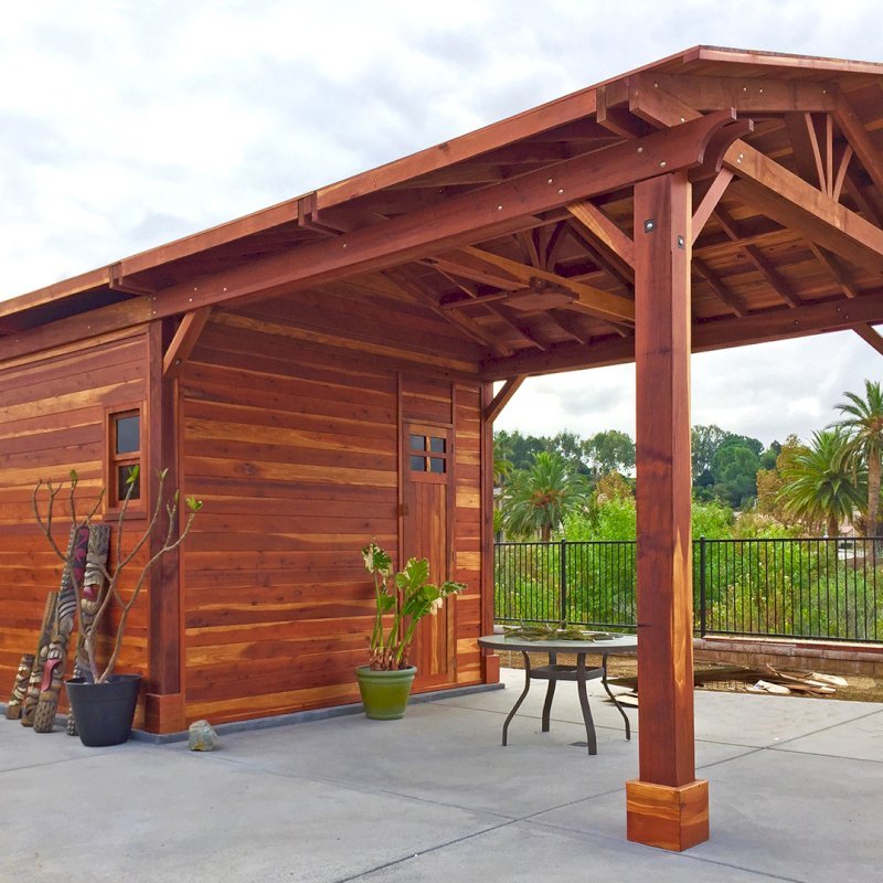 Custom Del Norte Outdoor Kitchen Pavilion with enclosed bathroom and front "porch area" (Options: 28' L x 14' W, California Redwood, 6-Post Kit for Gale-Wind, No Ceiling Fan Base, Electrical Wiring Trim Kit for 1 Post, Transparent Premium Sealant). Photo Courtesy of C. Nelson of Riverside, CA. Final roofing skin (composite shingles) was added a few days after these pictures were taken. Custom Del Norte Outdoor Kitchen Pavilion with enclosed bathroom and front "porch area" (Options: 28' L x 14' W, California Redwood, 6-Post Kit for Gale-Wind, No Ceiling Fan Base, Electrical Wiring Trim Kit for 1 Post, Transparent Premium Sealant). Photo Courtesy of C. Nelson of Riverside, CA. Final roofing skin (composite shingles) was added a few days after these pictures were taken.
