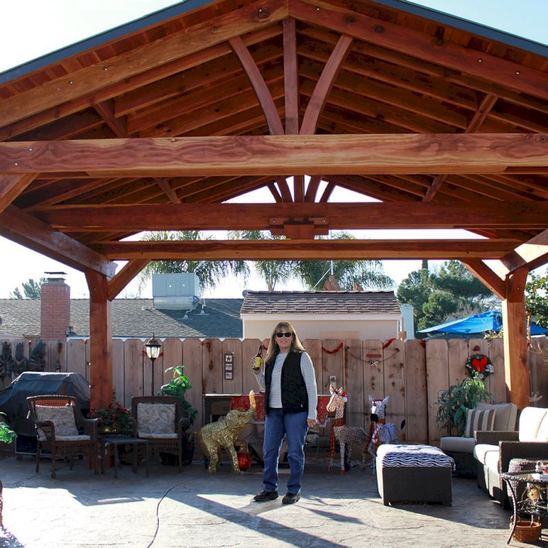 Del Norte Outdoor Kitchen Pavilion (Options: 16' L x 20' W, California Redwood, 4-Post Kit for Gale-Wind, With 1 Ceiling Fan Base, Electrical Wiring Trim Kit for 2 Posts, No Post Decorative Trim, Transparent Premium Sealant, 9 1/4" x 9 1/4" Posts & 1 1/2" x 9 1/4" Supports and Rafters by Custom Request). Photo Courtesy of P. Vejar of Merced, CA Del Norte Outdoor Kitchen Pavilion (Options: 16' L x 20' W, California Redwood, 4-Post Kit for Gale-Wind, With 1 Ceiling Fan Base, Electrical Wiring Trim Kit for 2 Posts, No Post Decorative Trim, Transparent Premium Sealant, 9 1/4" x 9 1/4" Posts & 1 1/2" x 9 1/4" Supports and Rafters by Custom Request). Photo Courtesy of P. Vejar of Merced, CA