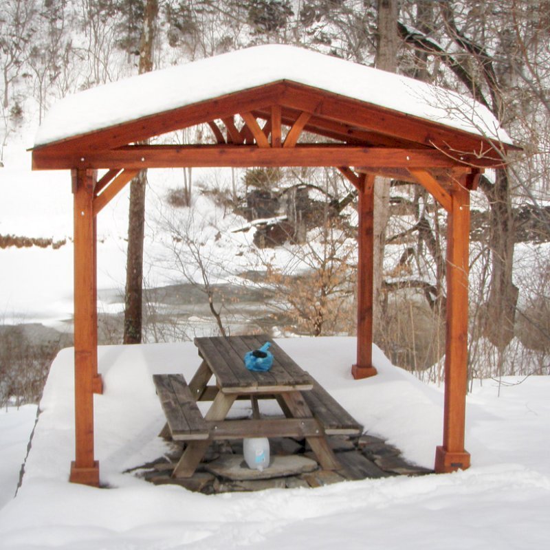 Del Norte Outdoor Kitchen Pavilion (Options: 12' L x 12' W, Mature Redwood, Unattached, 4-post Kit for Stone, No Electrical Wiring Trim, 9' Posts, No Ceiling Fan Base, No Privacy Panels, No Curtain Rods, Transparent Premium Sealant). Photo Courtesy of Lisa K. & Peter S. of Lexington, VA. Del Norte Outdoor Kitchen Pavilion (Options: 12' L x 12' W, Mature Redwood, Unattached, 4-post Kit for Stone, No Electrical Wiring Trim, 9' Posts, No Ceiling Fan Base, No Privacy Panels, No Curtain Rods, Transparent Premium Sealant). Photo Courtesy of Lisa K. & Peter S. of Lexington, VA.
