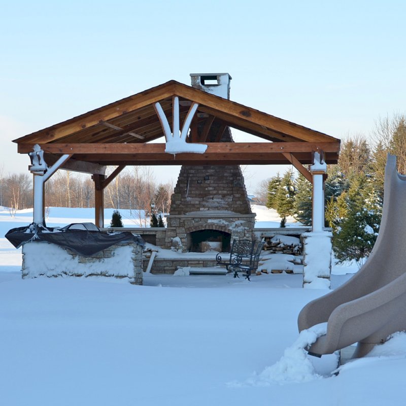 Del Norte Outdoor Kitchen Pavilion (Options: 20' L x 20' W, California Redwood, 4-Post Kit for Gale-Wind, 1 Ceiling Fan Base, Transparent Premium Sealant, Custom Cut Out in the Back Overhang to Fit the Fireplace). Photo Courtesy of Tom Mislenkov of Chesterton, Indiana. Del Norte Outdoor Kitchen Pavilion (Options: 20' L x 20' W, California Redwood, 4-Post Kit for Gale-Wind, 1 Ceiling Fan Base, Transparent Premium Sealant, Custom Cut Out in the Back Overhang to Fit the Fireplace). Photo Courtesy of Tom Mislenkov of Chesterton, Indiana.