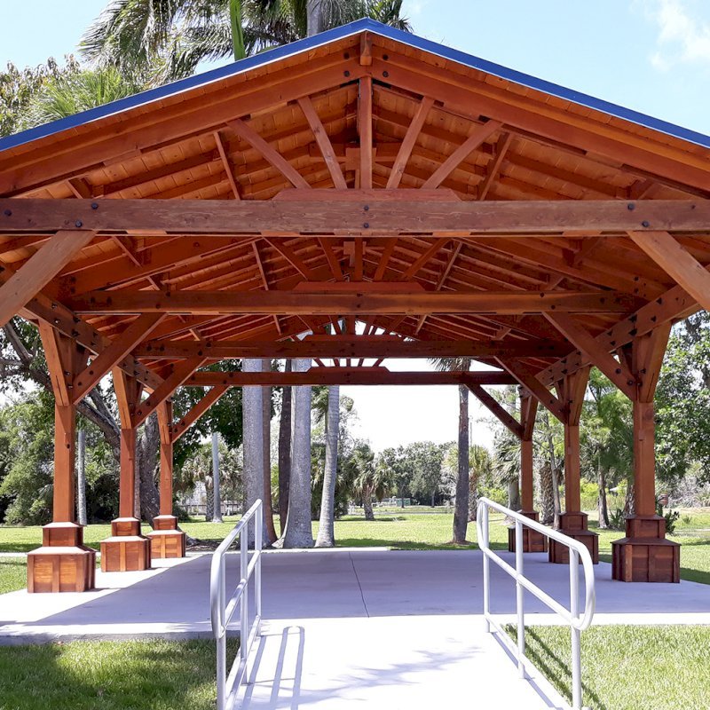 Custom Del Rio Cathedral Ceiling Thick Timber Pavilion (Options: 36' L x 24' Triangle Base W, No Privacy Panels, Douglas-fir, 10' ft Height, Electrical Wiring Trims for All Posts, With Custom Anchors and Hardware, Custom Trim Boxes at the Bottom of the Posts (Boots), 3 Ceiling Fan Bases, No Curtain Rods, Transparent Premium Sealant). This Pavilion can be seen at the South Florida Science Center, 4801 Dreher Trail N, West Palm Beach, FL 33405. Custom Del Rio Cathedral Ceiling Thick Timber Pavilion (Options: 36' L x 24' Triangle Base W, No Privacy Panels, Douglas-fir, 10' ft Height, Electrical Wiring Trims for All Posts, With Custom Anchors and Hardware, Custom Trim Boxes at the Bottom of the Posts (Boots), 3 Ceiling Fan Bases, No Curtain Rods, Transparent Premium Sealant). This Pavilion can be seen at the South Florida Science Center, 4801 Dreher Trail N, West Palm Beach, FL 33405.