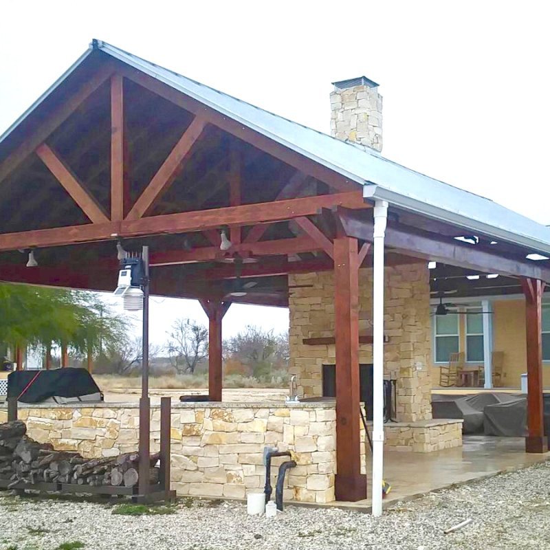 Del Rio Cathedral Ceiling Thick Timber Pavilion (Options: 42' L x 22' Triangle Base W, No Privacy Panels, Mature Redwood, 10' ft Height, Electrical Wiring Trim for 1 Post, 6-Post Hurricane Anchor Kit, No Post Decorative Trim, 2 Ceiling Fan Bases, No Curtain Rods, Transparent Premium Sealant). Note: Fireplace and kitchen counter was added after the Pavilion was installed by a Mason. Forever Redwood does not do masonry work, but our designs can incorporate them. Del Rio Cathedral Ceiling Thick Timber Pavilion (Options: 42' L x 22' Triangle Base W, No Privacy Panels, Mature Redwood, 10' ft Height, Electrical Wiring Trim for 1 Post, 6-Post Hurricane Anchor Kit, No Post Decorative Trim, 2 Ceiling Fan Bases, No Curtain Rods, Transparent Premium Sealant). Note: Fireplace and kitchen counter was added after the Pavilion was installed by a Mason. Forever Redwood does not do masonry work, but our designs can incorporate them.