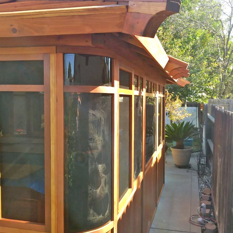 DIY Wood Gazebo (14' L, 12' W, California Redwood, All Sliding Windows with Screens, 4' x 6' Skylight, 36" H Siding Below Windows, Vertical Siding, Japanese Doors with Screens, No Flooring, Transparent Premium Sealant). Photo Courtesy of B. Adkisson of Sacramento, CA. XL Custom Roof per Customer Request. DIY Wood Gazebo (14' L, 12' W, California Redwood, All Sliding Windows with Screens, 4' x 6' Skylight, 36" H Siding Below Windows, Vertical Siding, Japanese Doors with Screens, No Flooring, Transparent Premium Sealant). Photo Courtesy of B. Adkisson of Sacramento, CA. XL Custom Roof per Customer Request.
