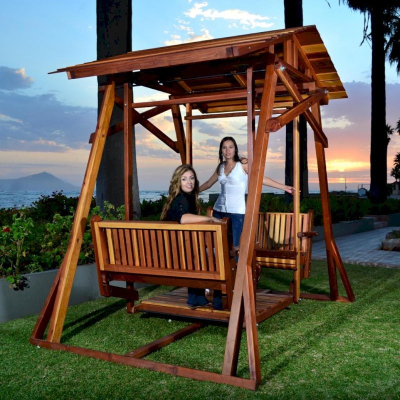 Dustin's Face to Face Gliders (Options: California Redwood, Standard Roof, Without Beverage Armrest, No Kid's Platform, No Engraving, Transparent Premium Sealant). Dustin's Face to Face Gliders (Options: California Redwood, Standard Roof, Without Beverage Armrest, No Kid's Platform, No Engraving, Transparent Premium Sealant).