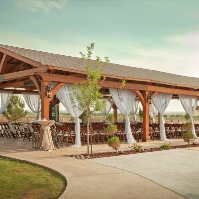 El Paso Wedding Pavilion (Options: 30' x 60', Mature Redwood, 8-Post Anchor Kit for High-Wind, Transparent Premium Sealant). Photo Courtesy of Mr. & Ms. Rodriguez of El Paso Grace Gardens, 6701 Westside Dr. El Paso, Texas, 79932. We can build your Pavilion any size you need.