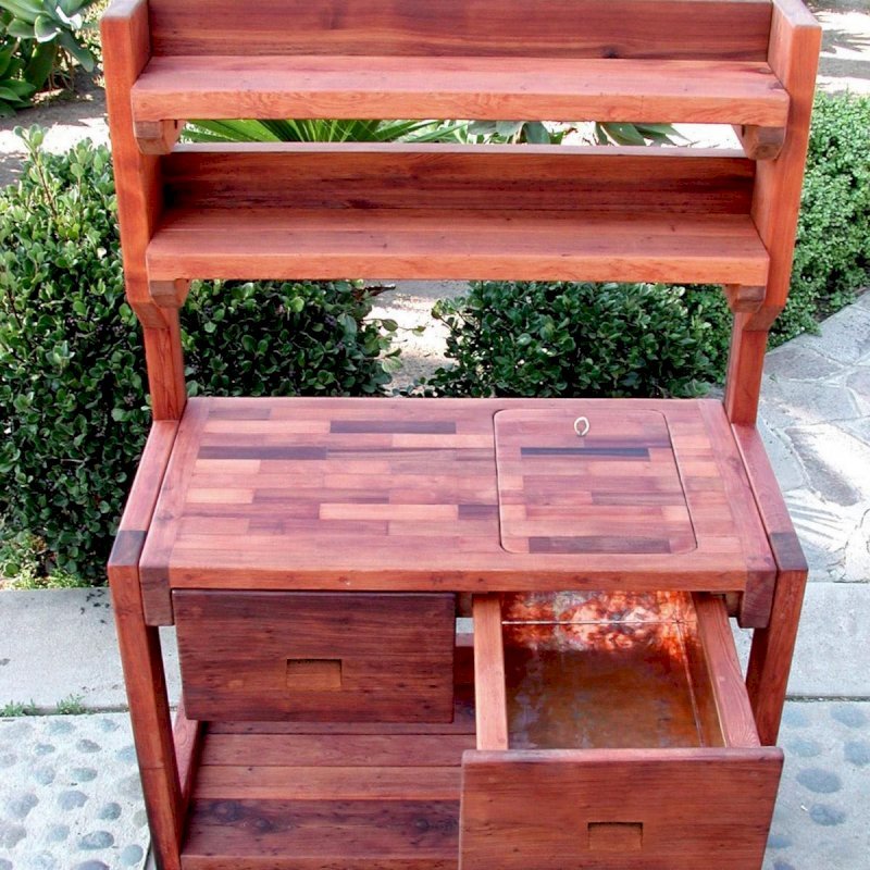 Eli's Redwood Potting Bench (Options: Standard Size, Old-Growth Redwood, Casters, 2 Shelves, Copper Inset for Right Drawer, No Engraving, Removable Lid on Right Side, Transparent Premium Sealant). Photo shows tabletop lid removed. Eli's Redwood Potting Bench (Options: Standard Size, Old-Growth Redwood, Casters, 2 Shelves, Copper Inset for Right Drawer, No Engraving, Removable Lid on Right Side, Transparent Premium Sealant). Photo shows tabletop lid removed.