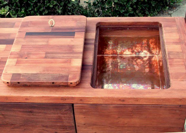 Eli's Redwood Potting Bench (Options: Standard Size, Old-Growth Redwood, Casters, 2 Shelves, Copper Inset for Right Drawer, No Engraving, Removable Lid on Right Side, Transparent Premium Sealant). Photo shows tabletop lid removed. Eli's Redwood Potting Bench (Options: Standard Size, Old-Growth Redwood, Casters, 2 Shelves, Copper Inset for Right Drawer, No Engraving, Removable Lid on Right Side, Transparent Premium Sealant). Photo shows tabletop lid removed.