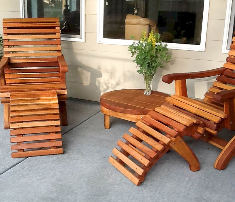 Ensenada Wood Easy Chair (Options: Standard Size, California Redwood, No Cushion, Ottoman, Transparent Premium Sealant). Photo also shows a Round Side Table. Ensenada Wood Easy Chair (Options: Standard Size, California Redwood, No Cushion, Ottoman, Transparent Premium Sealant). Photo also shows a Round Side Table.