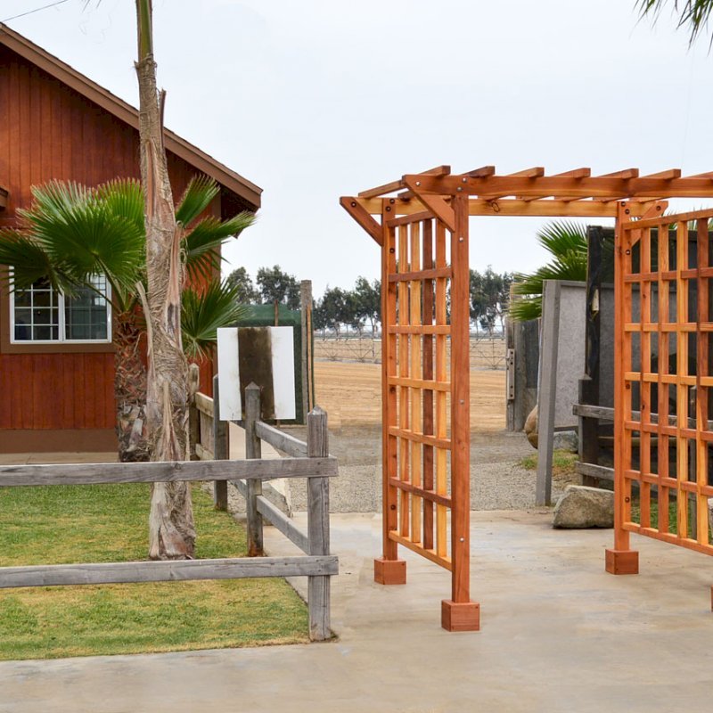 Entryway Arbor (Options: 80" W, 60" D, California Redwood, 4-Post Archor Kit for Stone, Brick or Concrete, Transparent Premium Sealant). Entryway Arbor (Options: 80" W, 60" D, California Redwood, 4-Post Archor Kit for Stone, Brick or Concrete, Transparent Premium Sealant).