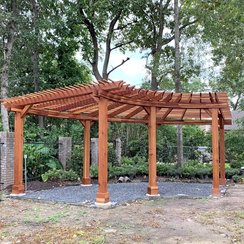 Fan Shaped Pergola Kit (Options: 28' x 12', California Redwood, With Roof Slats at 6", No Electrical Wiring Trim Kit, 7-Post Anchor Kit for Concrete, No Ceiling Fan Base, 9' Posts, No Curtain Rods, Transparent Premium Sealant). Photo Courtesy of Areté Landscape Design @ B. Pfeffer in Houston, TX. Fan Shaped Pergola Kit (Options: 28' x 12', California Redwood, With Roof Slats at 6", No Electrical Wiring Trim Kit, 7-Post Anchor Kit for Concrete, No Ceiling Fan Base, 9' Posts, No Curtain Rods, Transparent Premium Sealant). Photo Courtesy of Areté Landscape Design @ B. Pfeffer in Houston, TX.